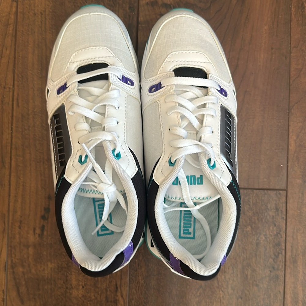 Puma purple and white sneakers in size 6